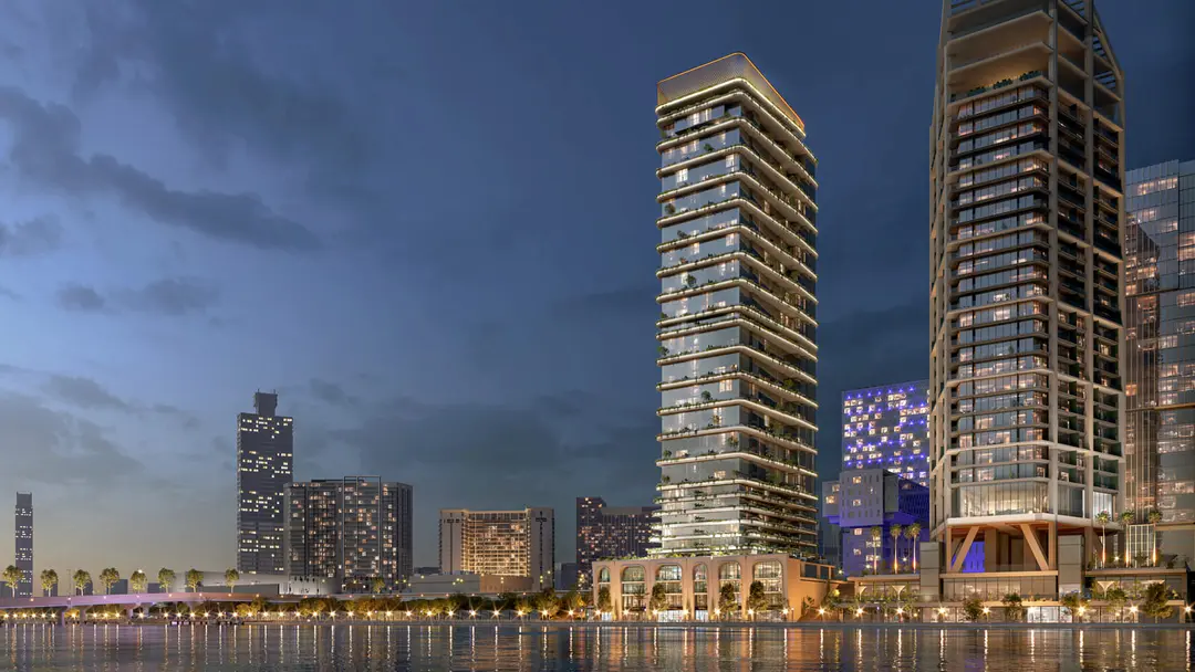 Stunning exterior view of Reportage Tower on Al Maryah Island, Abu Dhabi, showcasing luxury canal-view high-rise residences.