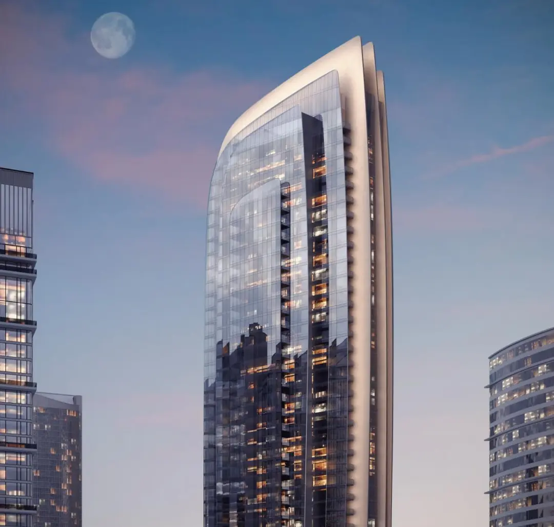 Panoramic living room at W Residences with floor-to-ceiling windows offering stunning Al Maryah Island city and waterfront views.